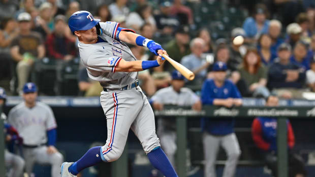 Sep 27, 2022; Seattle, Washington, USA; Texas Rangers third baseman Josh Jung (6) hits a home run against the Seattle Mariners during the second inning at T-Mobile Park. Mandatory Credit: Steven Bisig-USA TODAY Sports